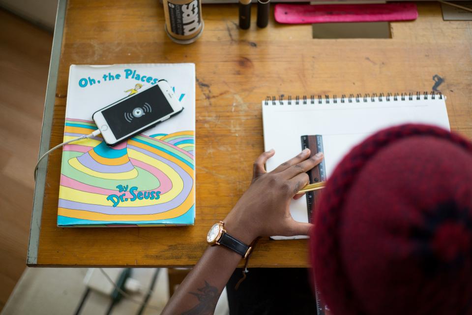 A student working at a school desk
